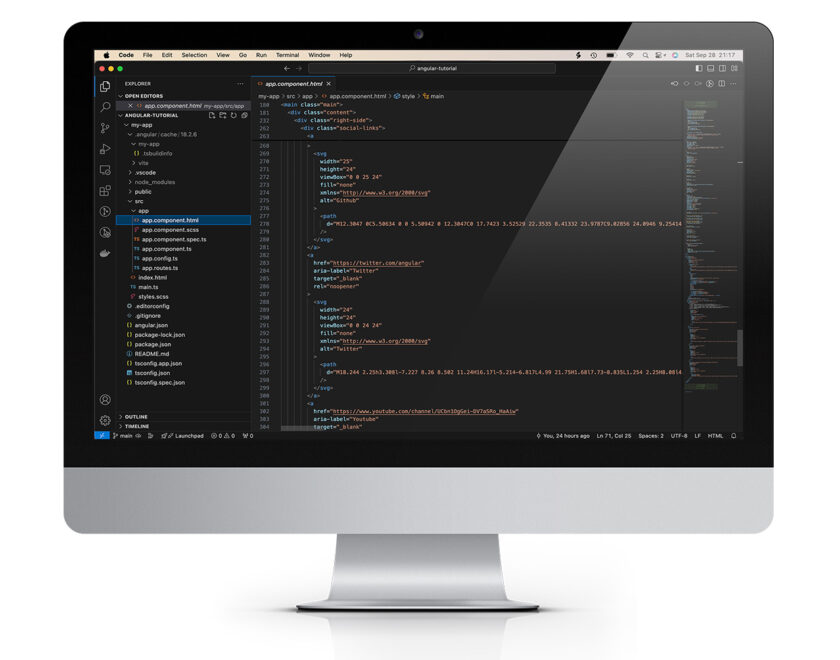 Depiction of iMac with Microsoft Visual Studio code on screen